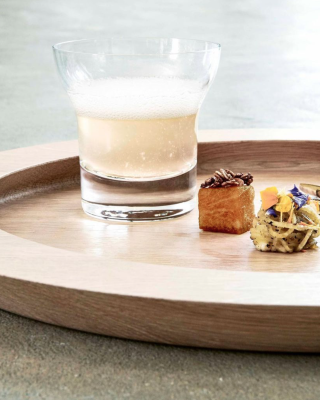 Exterior wooden tray with glassware and appetisers